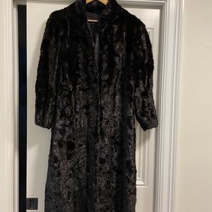 Women’s sz10 long black mink coat. Beautifully kept in breathable garment bag.